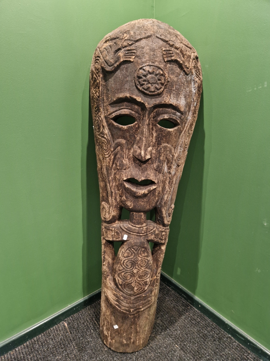 A VERY LARGE EASTERN CARVED WOOD "MASK".