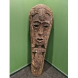 A VERY LARGE EASTERN CARVED WOOD "MASK".