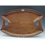 AN ARTS AND CRAFTS OAK TWO HANDLED TRAY INDISTINCTLY SIGNED BY A CRAFTSMAN FROM RYE