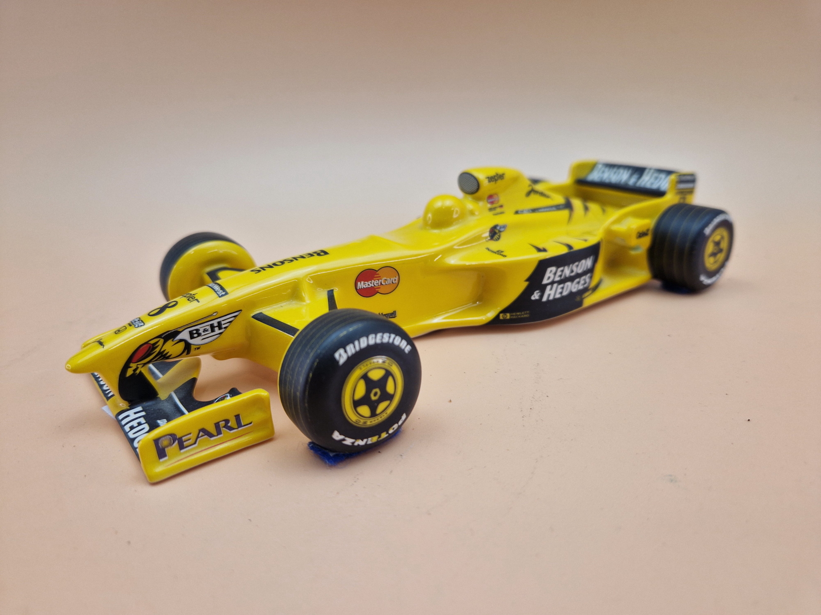 A RARE KARLOVARSKY PORCELAIN FORMULA ONE JORDON RACE CAR