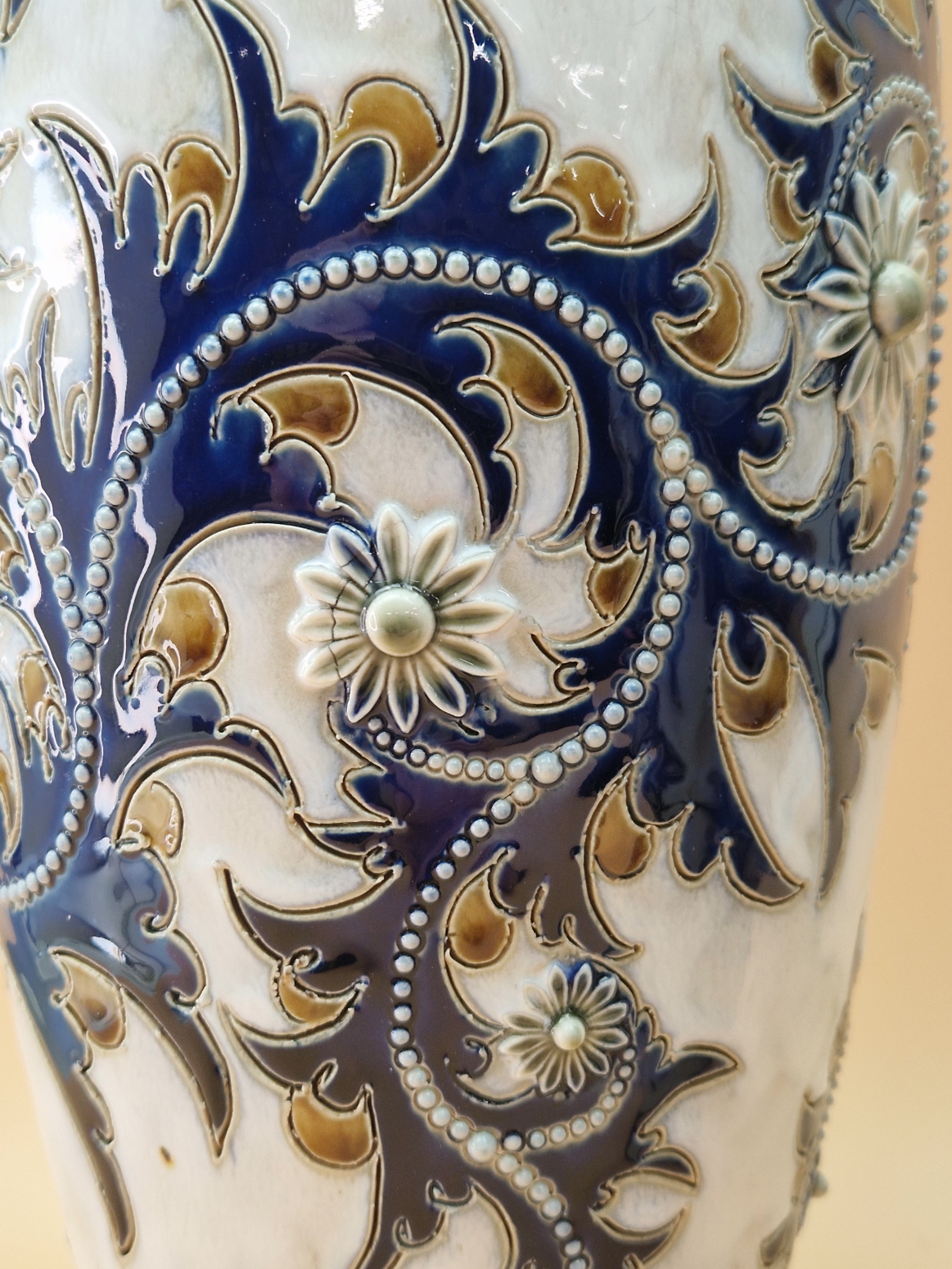 A PAIR OF ROYAL DOULTON VASES BY GEORGE TINWORTH DECORATED IN RELIEF WITH BEADED BLUE VINES - Image 7 of 8