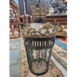 A BLACK AND GILT THREE SOCKET LANTERN, THE DOUBLE CROWN TOP ABOVE TAPERING CYLINDRICAL SIDES. H