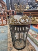 A BLACK AND GILT THREE SOCKET LANTERN, THE DOUBLE CROWN TOP ABOVE TAPERING CYLINDRICAL SIDES. H