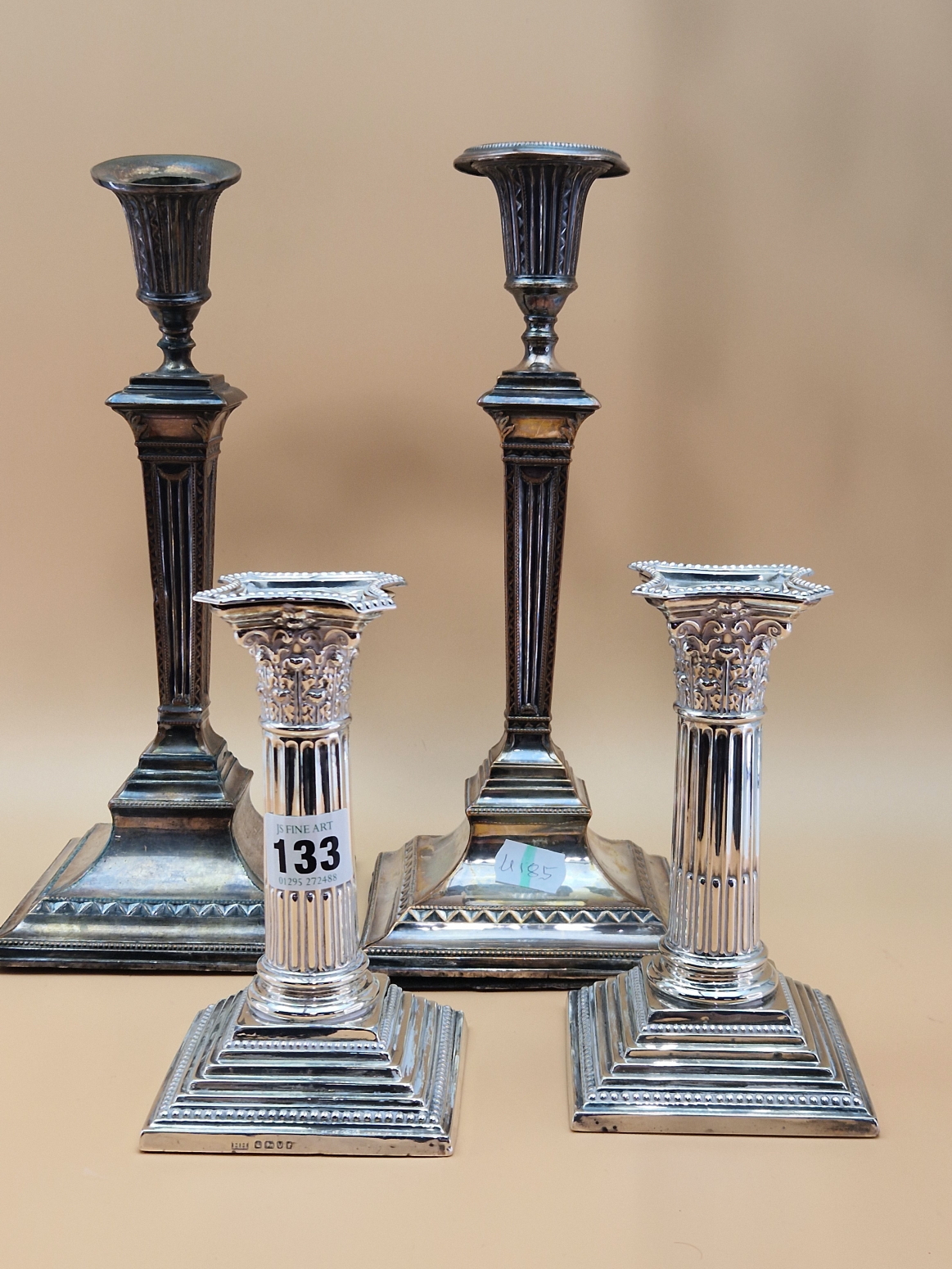 A PAIR OF SILVER STOP FLUTED CORINTHIAN COLUMN CANDLESTICKS BY HARRISON BROTHERS AND HOWSON,