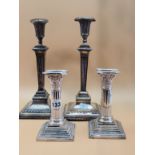 A PAIR OF SILVER STOP FLUTED CORINTHIAN COLUMN CANDLESTICKS BY HARRISON BROTHERS AND HOWSON,