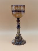 A BLUE JOHN GOBLET, THE BOWL WITH A CENTRAL PURPLE BAND AND RAISED ON A TURNED STEM WITH A