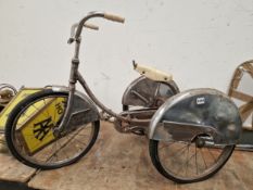 A RETRO CHILDS TRICYCLE.