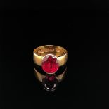 AN ANTIQUE 22ct HALLMARKED GOLD GEMSET RING, WITH A 10ct GOLD SETTING. DATED 1908, BIRMINGHAM.