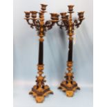 A PAIR OF 19th C. ORMOLU, BRONZE AND BLACK SLATE FIVE LIGHT CANDELABRA SUPPORTED ON TRIPARTITE