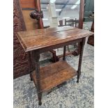 A 19th C. OAK TWO TIER TABLE WITH BOBBIN TURNED LEGS