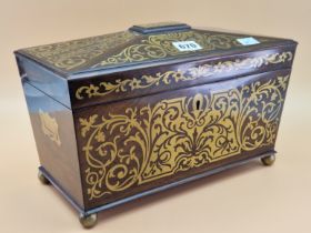 A BRASS INLAID ROSEWOOD SARCOPHAGUS SHAPED REGENCY TEA CADDY CONTAINING TWO CANISTERS AND A GLASS M
