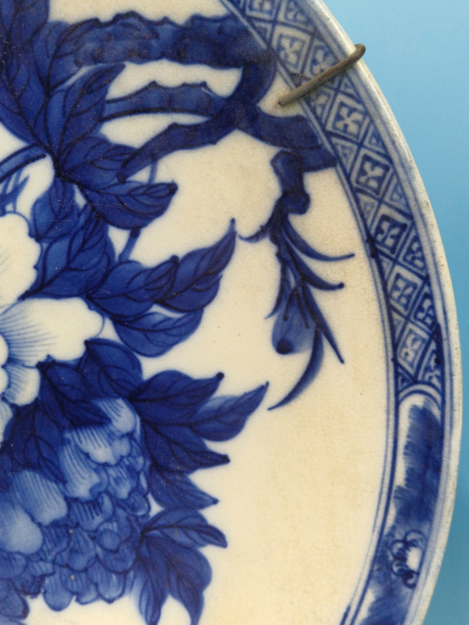 TWO CHINESE POTTERY BLUE AND WHITE CHARGERS, ONE PAINTED WITH A BIRD PERCHED ON A CHERRY BLOSSOM - Image 8 of 9