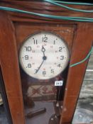 A GENT OF LEICESTER ELECTRIC CLOCK IN A GLAZED MAHOGANY CASE. H 134cms.