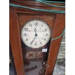 A GENT OF LEICESTER ELECTRIC CLOCK IN A GLAZED MAHOGANY CASE. H 134cms.