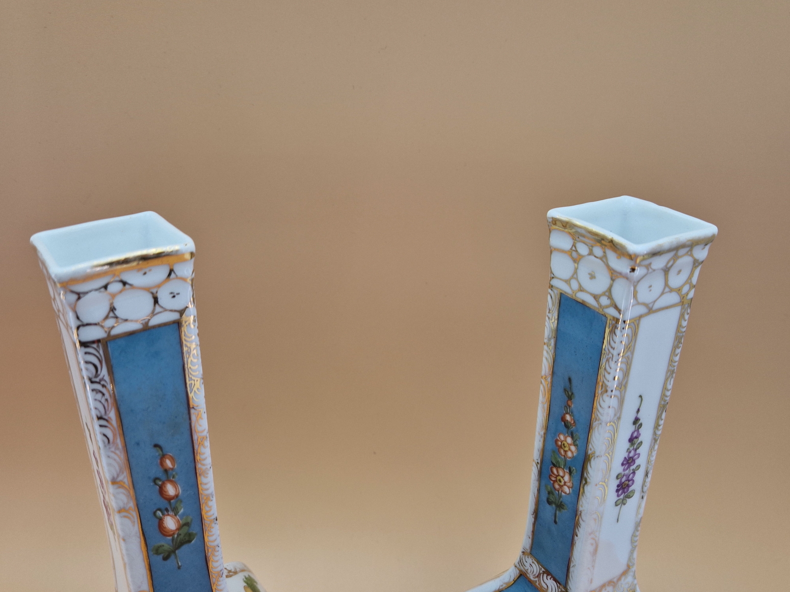 A PAIR OF CROWN DRESDEN SQUARE SECTIONED BOTTLE VASES PAINTED WITH BLUE GROUND FLORAL PANELS - Image 4 of 5