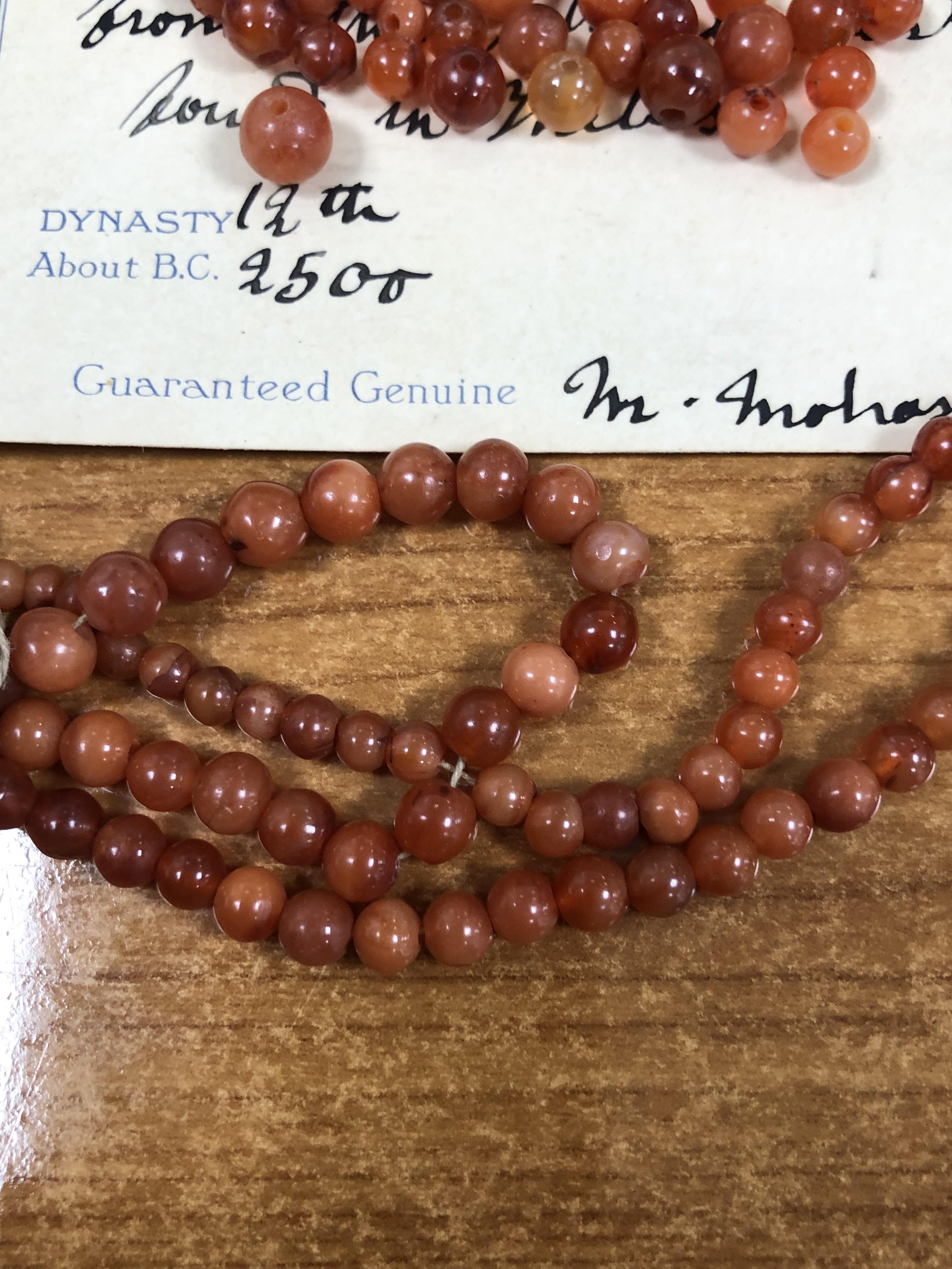 A COLLECTION OF EGYPTIAN CORNELIAN SPHERICAL BEADS - Image 7 of 7