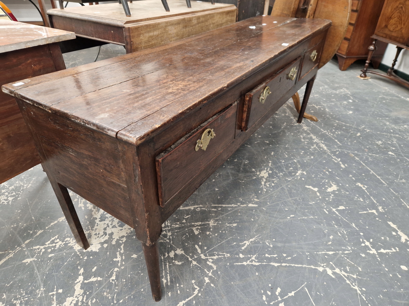 A 19th C. OAK THREE DRAWER DRESSER ON TAPERING CYLINDRICAL FRONT LEGS. W 172 x D 49 x H 70cms. - Image 2 of 4