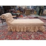 A VICTORIAN DAY BED ON TURNED LEGS WITH BRASS CASTORS