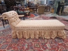 A VICTORIAN DAY BED ON TURNED LEGS WITH BRASS CASTORS