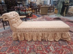 A VICTORIAN DAY BED ON TURNED LEGS WITH BRASS CASTORS