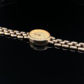 A 9ct HALLMARKED GOLD ACCURIST LADIES WRIST WATCH. GROSS WEIGHT 18.89grms.