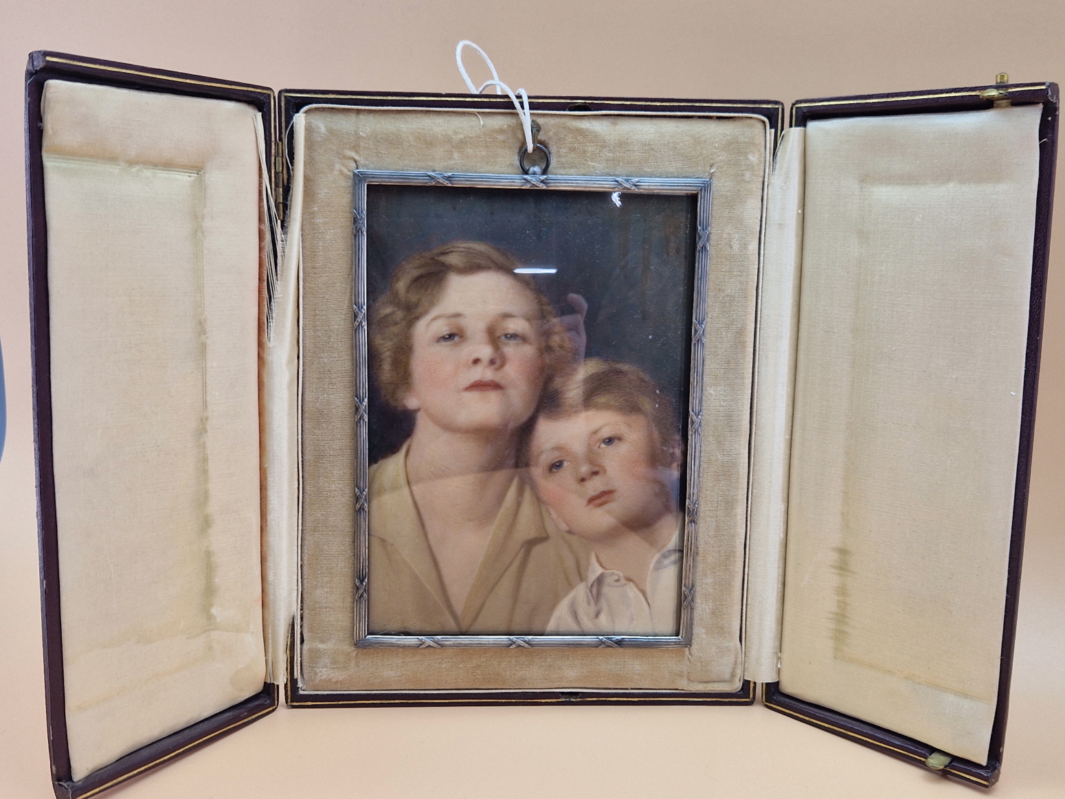TWO PRE WWII EASEL BACKED LEATHER CASED OVER PAINTED PHOTOGRAPHIC MINIATURES OF A LADY, ONE - Image 2 of 4