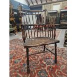 AN 18TH / 19TH CENTURY COUNTRY MADE WINDSOR TYPE STICK BACK CHAIR WITH PLAIN CREST RAIL AND SHAPED