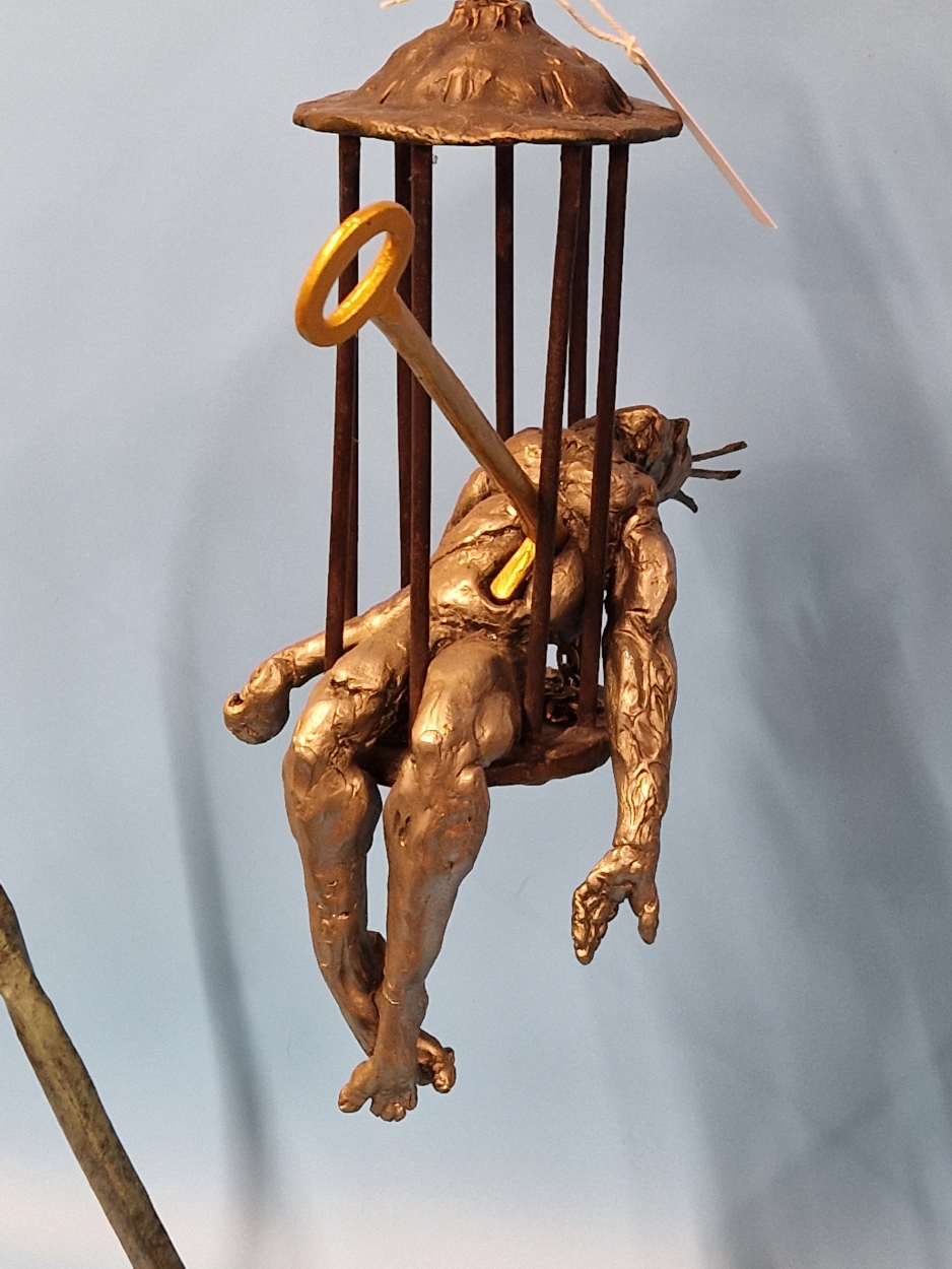 FELIPE GONZALEZ, A CONTEMPORARY BRONZE SCULPTURE OF A MAN IN A CAGE HELD ON A BRACKET ARM RESTING ON - Image 11 of 13