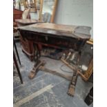 A CHINESE BLACK LACQUER NEEDLE WORK TABLE, THE TOP FORMING A LID OVER THREE COMPARTMENTS, A DRAW OUT