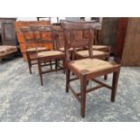 A SET OF SIX EARLY 19th C. OAK DINING CHAIRS WITH DROP IN RUSH SEATS