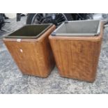 A PAIR OF ART DECO WALNUT WASTE BINS WITH METAL LINERS.