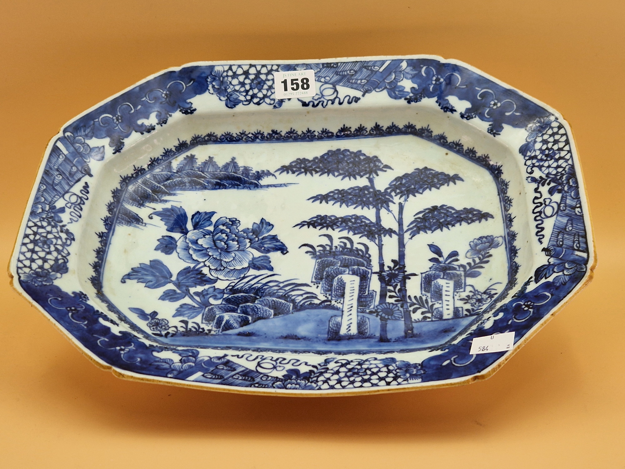 AN 18th C. CHINESE BLUE AND WHITE PLATTER CENTRALLY PAINTED WITH BAMBOO, ROCKS AND A PEONY ON AN - Image 2 of 5