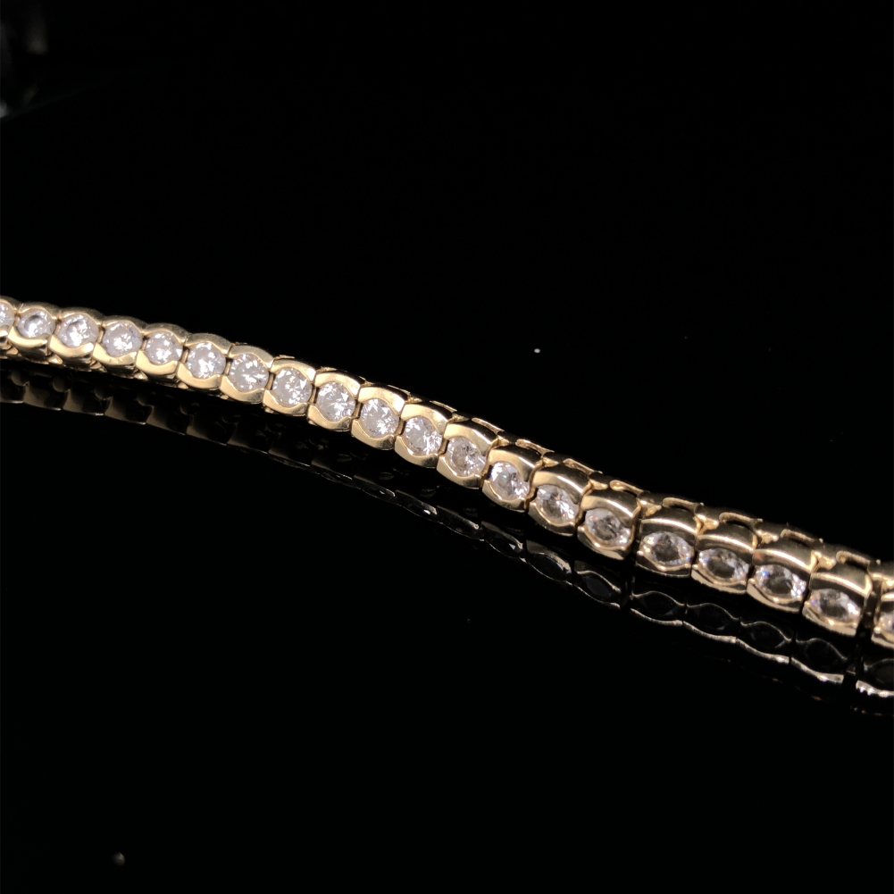 A DIAMOND LINE BRACELET. THE BRACELET WITH FORTY-SIX SLIGHTLY GRADUATED ROUND BRILLIANT CUT DIAMONDS - Image 3 of 15