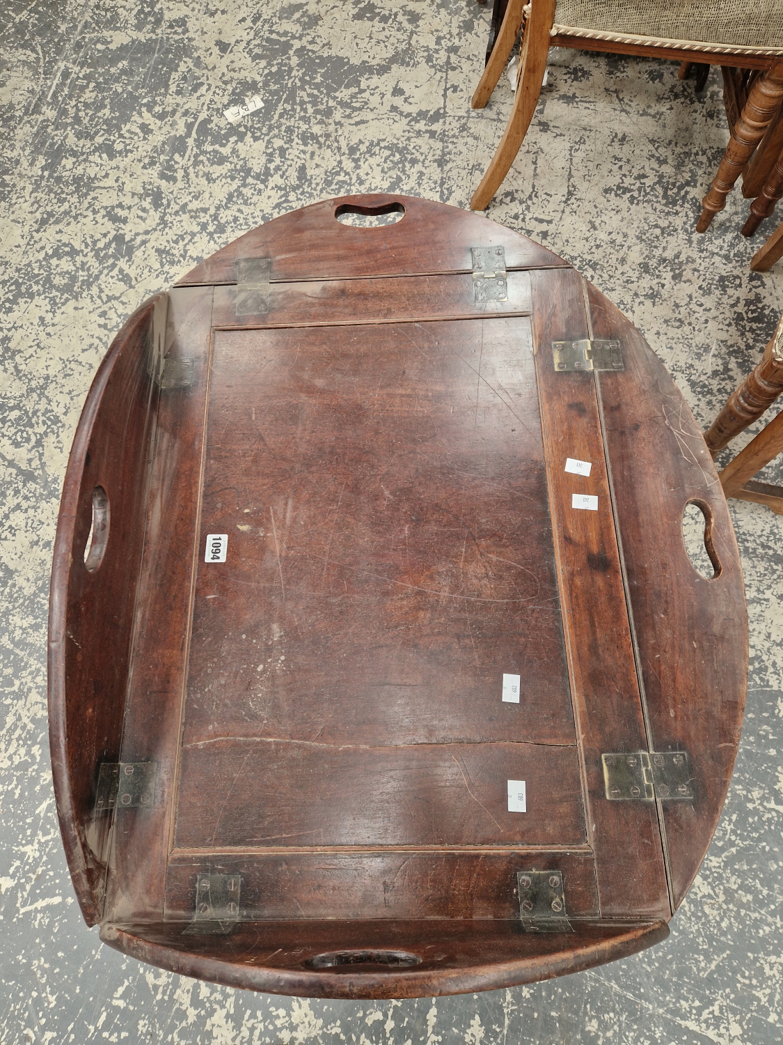 A 19TH CENTURY MAHOGANY BUTLERS TRAY WITH FOLDING SIDES. TOGETHER WITH AN ASSOCIATED STAND.