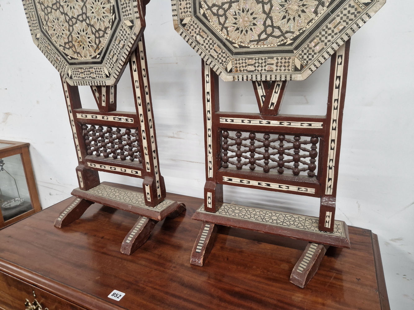 A PAIR OF ISLAMIC FOLDING OCTAGONAL TABLES GEOMETRICALLY INLAID IN MOTHER OF PEARL AND EBONY - Image 5 of 13