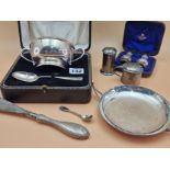 A HALLMARKED SILVER CASED TWO HANDLED BOWL AND SPOON SET, A SHALLOW TWO HANDLED DISH, CASED SALT AND
