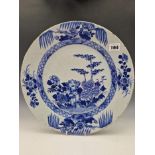 A LATE 18th C. CHINESE BLUE AND WHITE CHARGER PAINTED CENTRALLY WITH PEONY AND BAMBOO GROWING