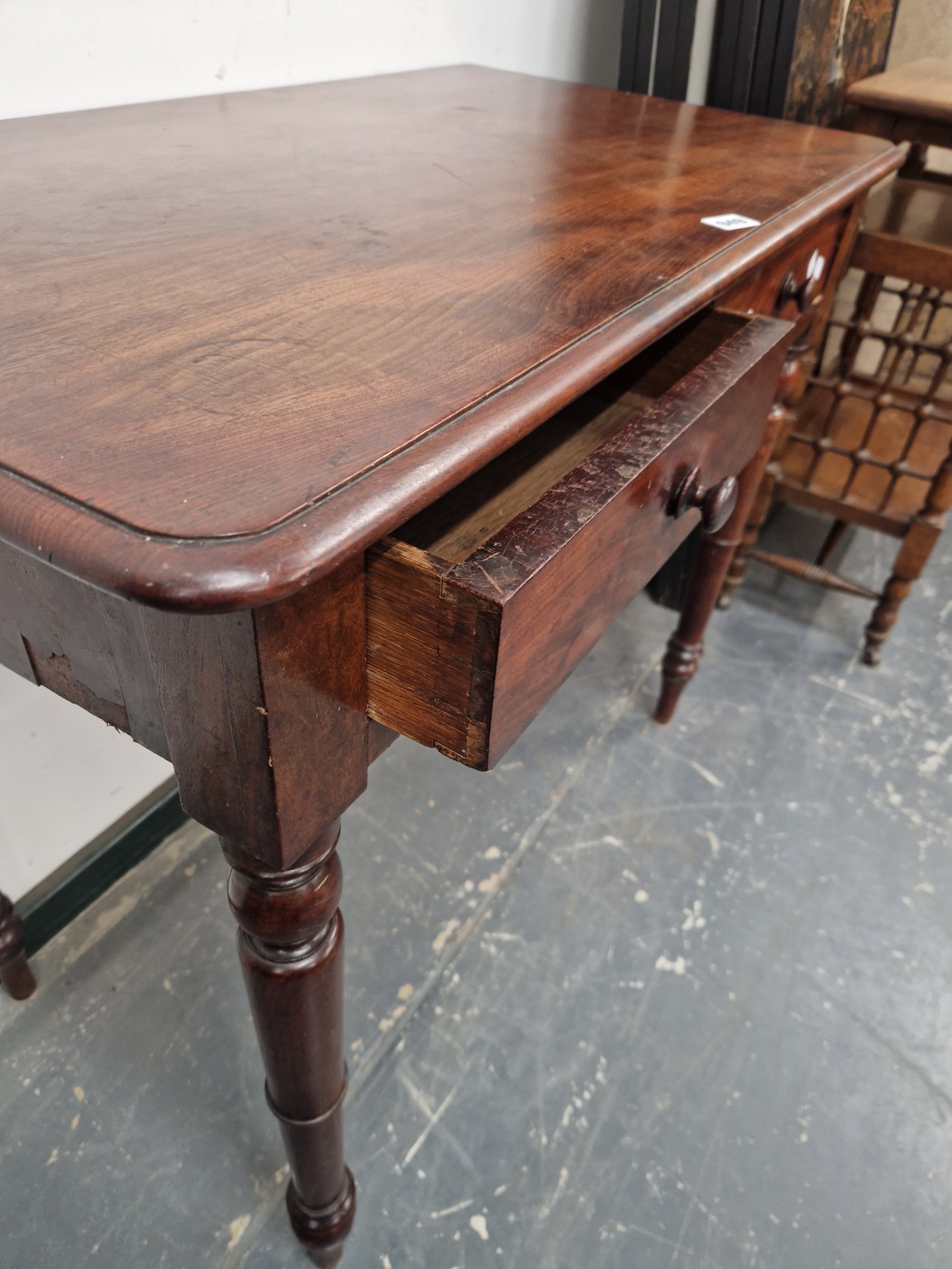 A 19th C. MAHOGANY TWO DRAWER TABLE WITH A RECTANGULAR TOP ON TURNED CYLINDRICAL LEGS WITH SPINDLE - Image 4 of 4
