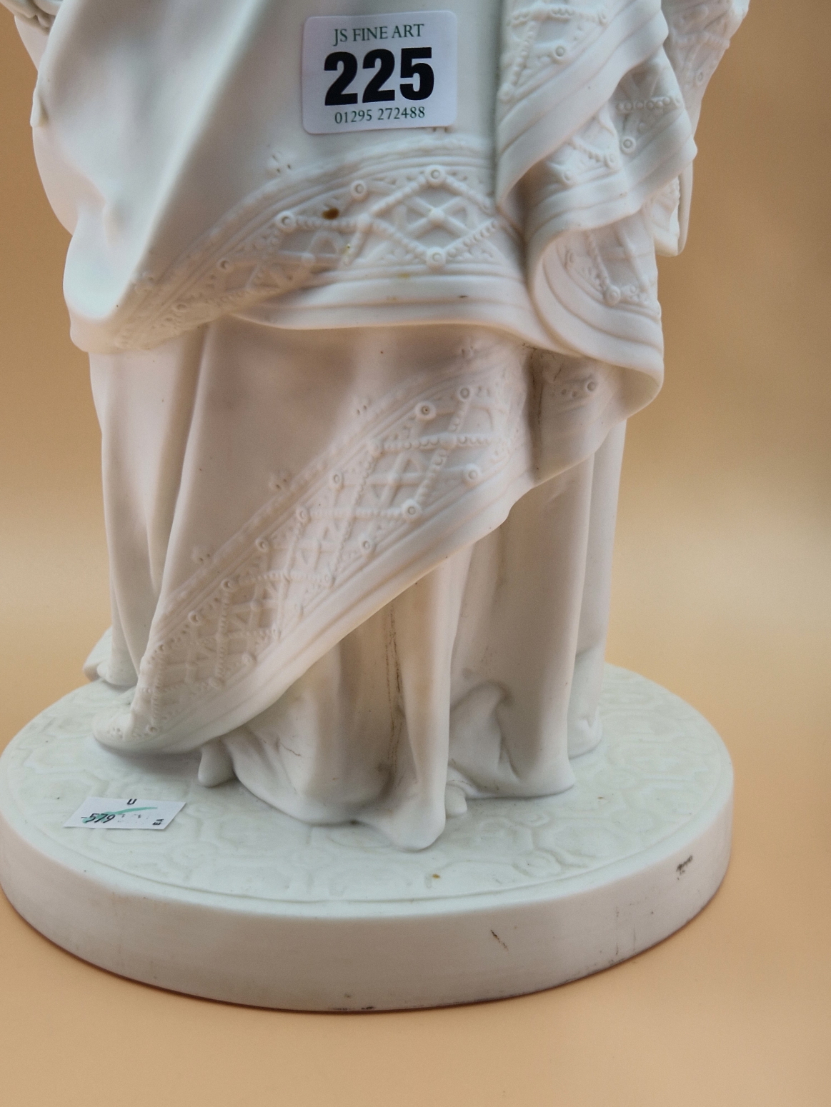 A MINTON PARIAN FIGURE OF A VICTORIAN LADY STANDING ON A CIRCULAR CARPET MOULDED BASE HOLDING UP A - Image 2 of 10