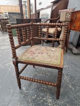 A VICTORIAN BOBBIN TURNED CORNER CHAIR.