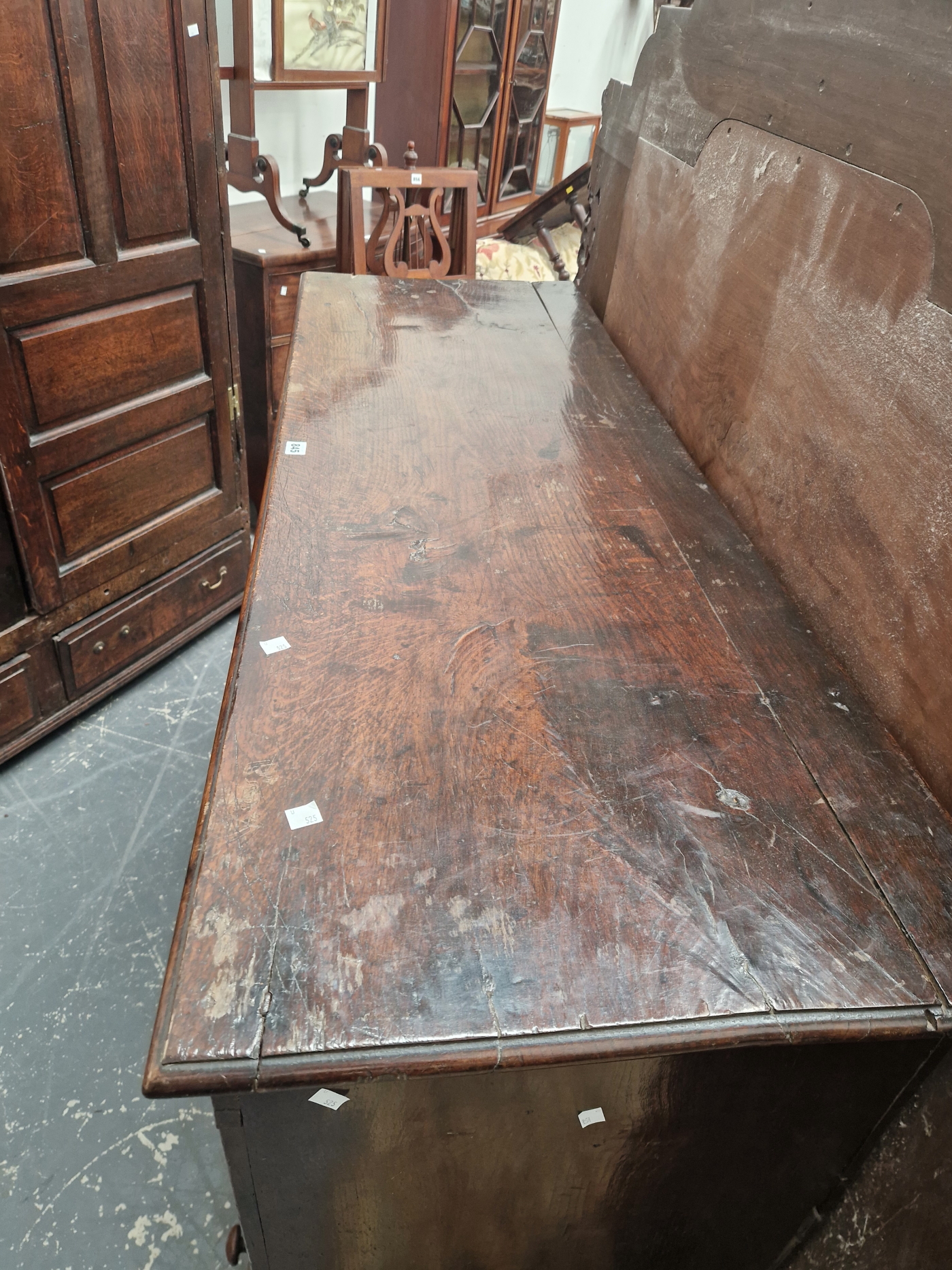 AN 18th C. OAK MULE CHEST WITH A FOUR PANELLED FRONT ABOVE THREE DRAWERS. W 143 x D 50 x H 111cms. - Image 7 of 7