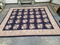 A LARGE NEEDLEPOINT CARPET OF FRENCH DESIGN.