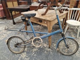 A MOULTON BLUE STOWAWAY BICYCLE