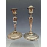 PAIR OF SILVER CANDLESTICKS, THE TALLER BY WILLIAM HUTTON AND SONS, LONDON 1907. H 19.5cms