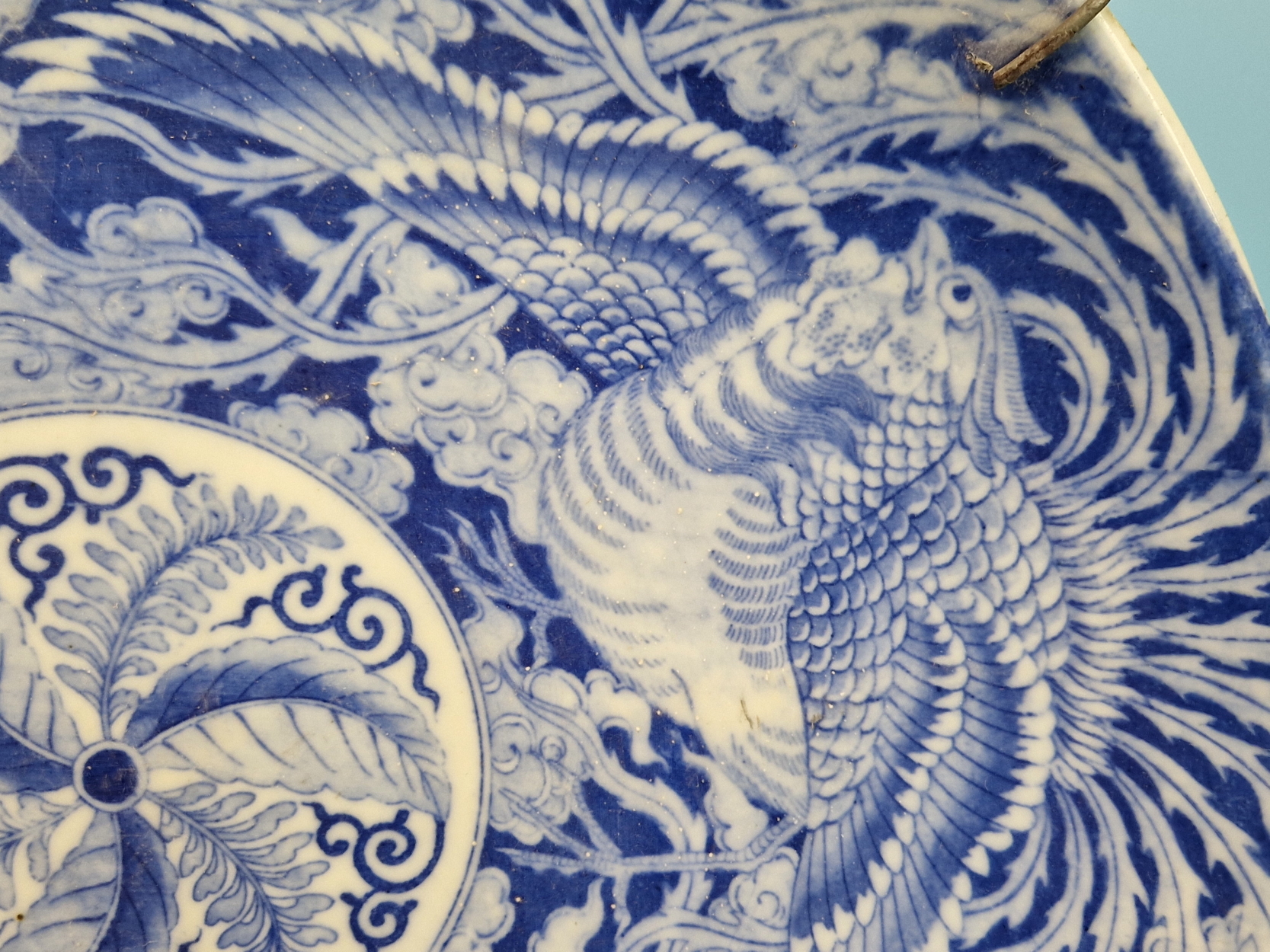 A PAIR OF JAPANESE BLUE AND WHITE CHARGERS PRINTED WITH DRAGONS AND PHOENIX ENCLOSING ROSETTES. Dia. - Image 2 of 11