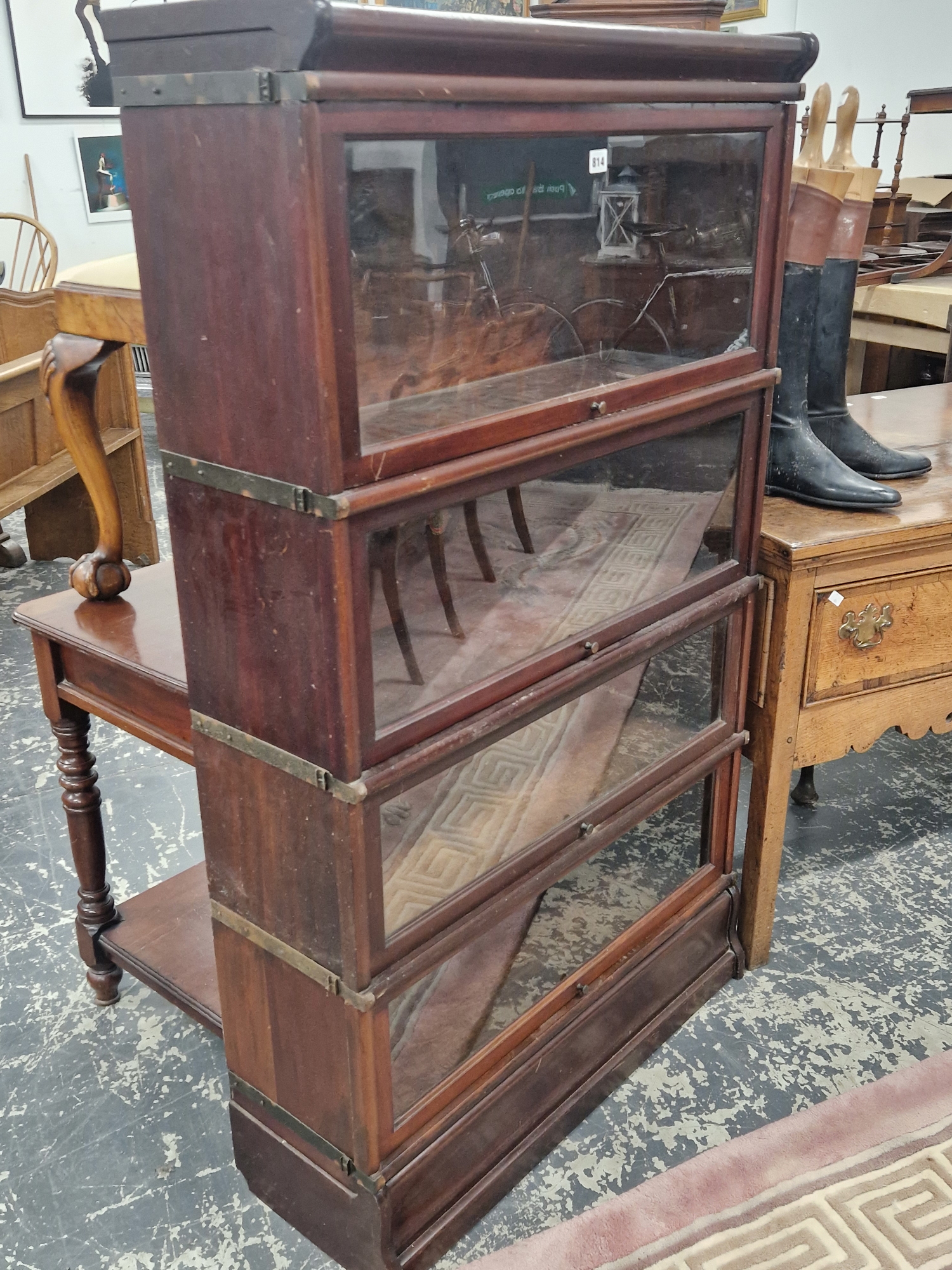 TWO GLOBE WERNICKE GLAZED MAHOGANY FOUR TIER BOOKCASES