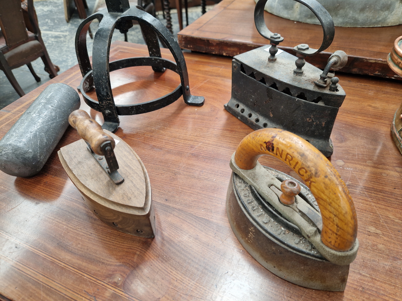 A PAIR OF SPIRALLY WROUGHT IRON FLOOR STANDING CANDLESTICKS, SIX CLOTHES IRONS, A MINERS LAMP AND - Image 5 of 7