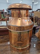 A UNITED DAIRIES COPPER MILK CHURN