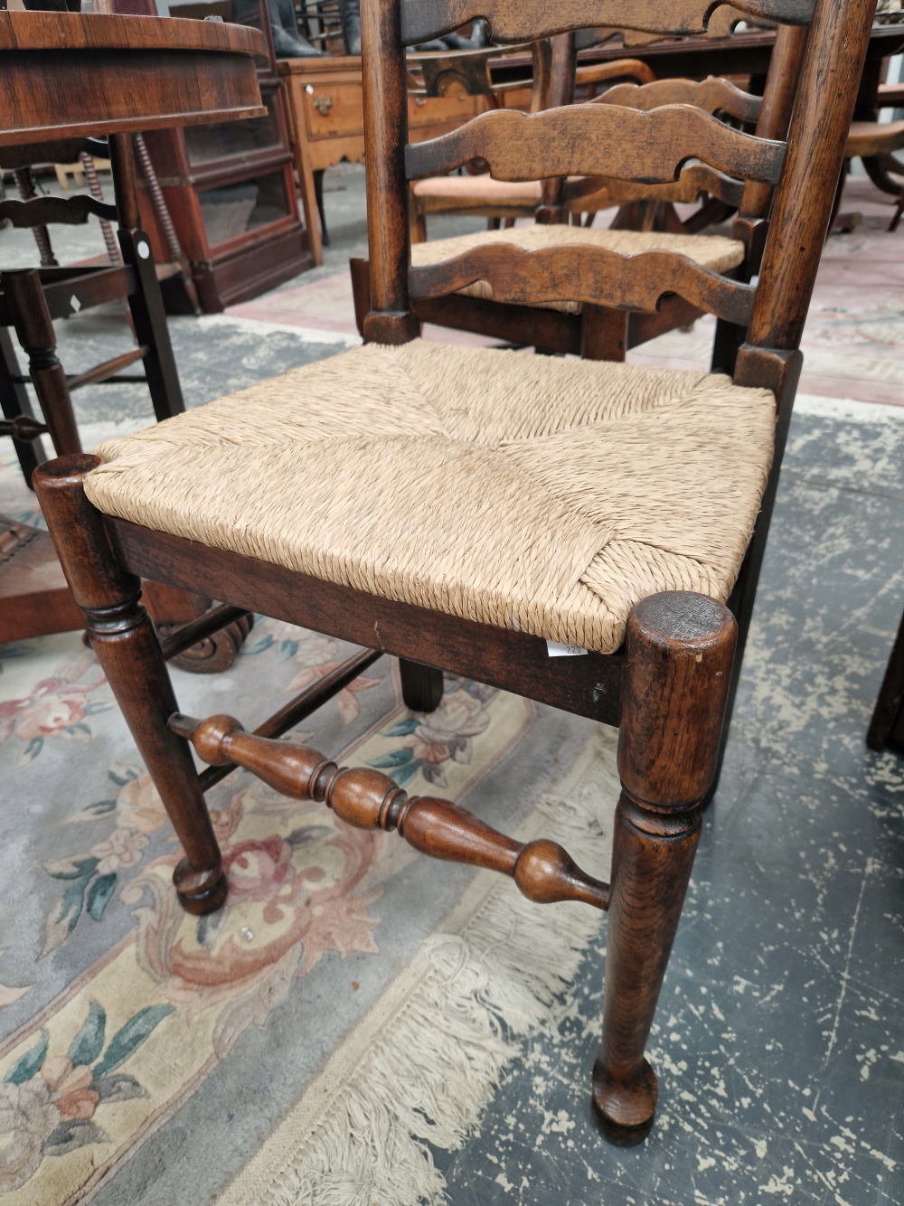 A SET OF SIX OAK LADDER BACK CHAIRS WITH RUSH DROP IN SEATS - Image 2 of 4
