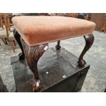 A MAHOGANY STOOL, THE PINK VELVET SEAT ON CABRIOLE LEGS WITH BALL AND CLAW FEET